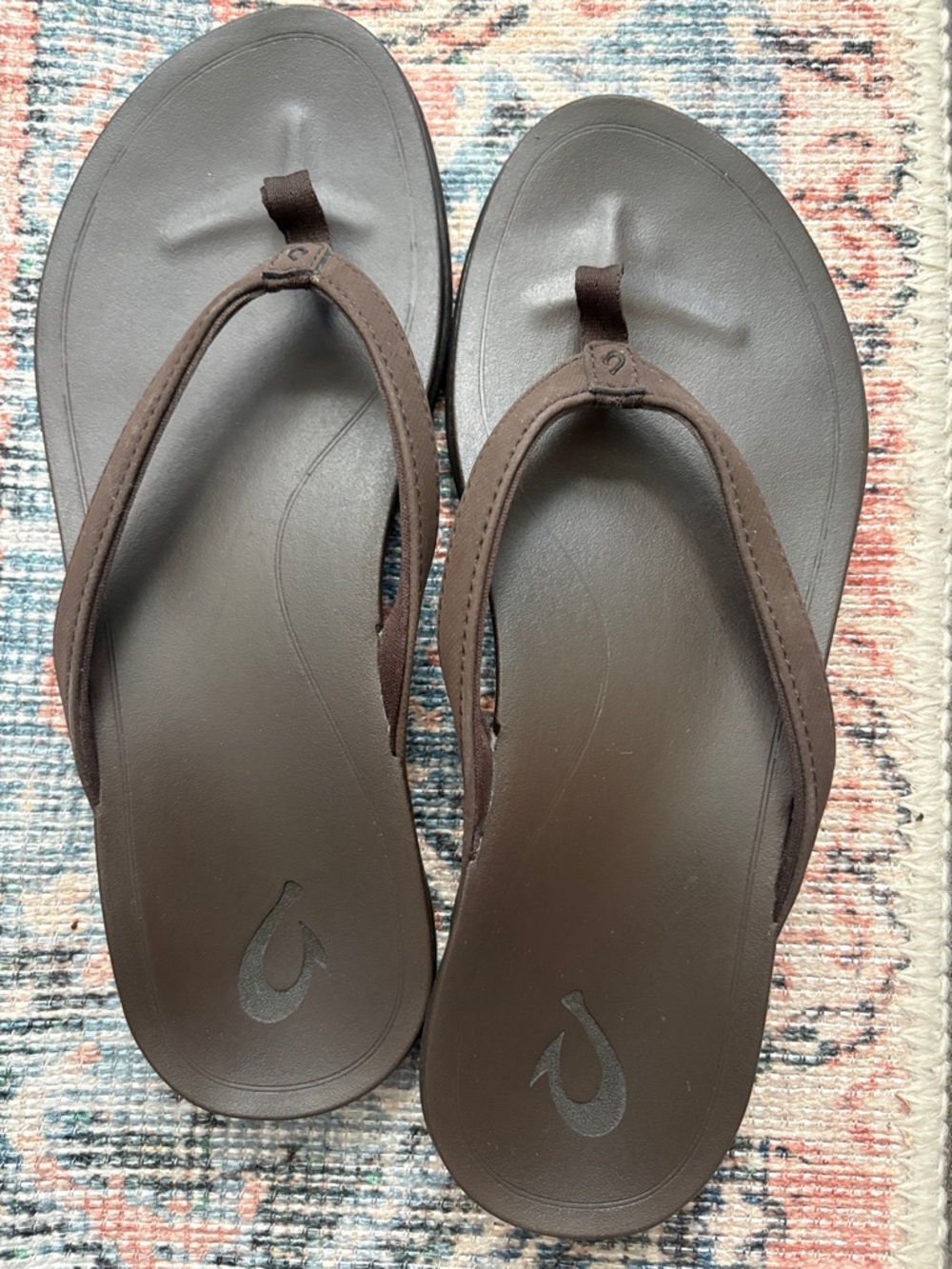 OluKai Brown and Black Flip Flop Sandals